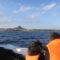 伊江島沖から、漁船に乗って伊江島タッチューを眺める。