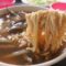 台湾・台南「阿輝炒鱔魚」鱔魚意麵煉は低温油で調理されたフライ麺とタウナギが入った甘じょっぱい温麵だった。